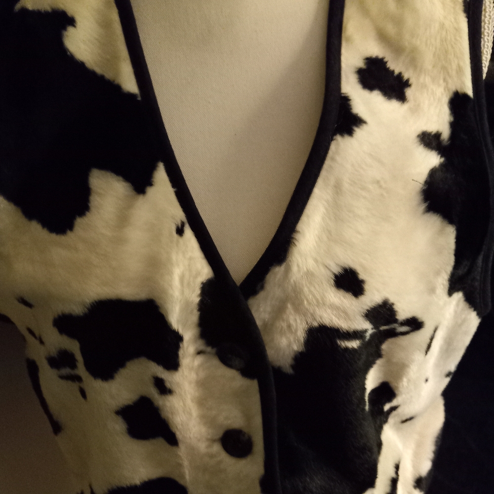 Not new,never worn, with tag faux pony pattern front vest with black cotton back